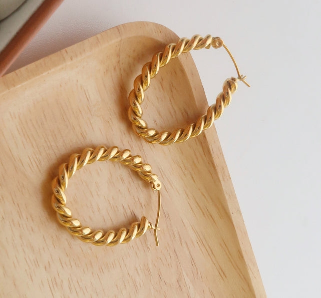 Twist braided earrings gold plated smooth titanium steel